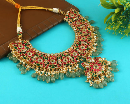 Jadau Kundan Necklace Set is beautifully handcrafted with premium Kundan stones in a classic Jadau setting. Inspired by the royal heritage of Rajasthan and Mughal artistry, this elegant set includes a matching pair