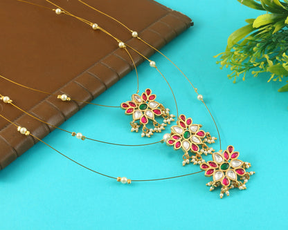 Jadau Kundan Necklace Set is beautifully handcrafted with premium Kundan stones in a classic Jadau setting. Inspired by the royal