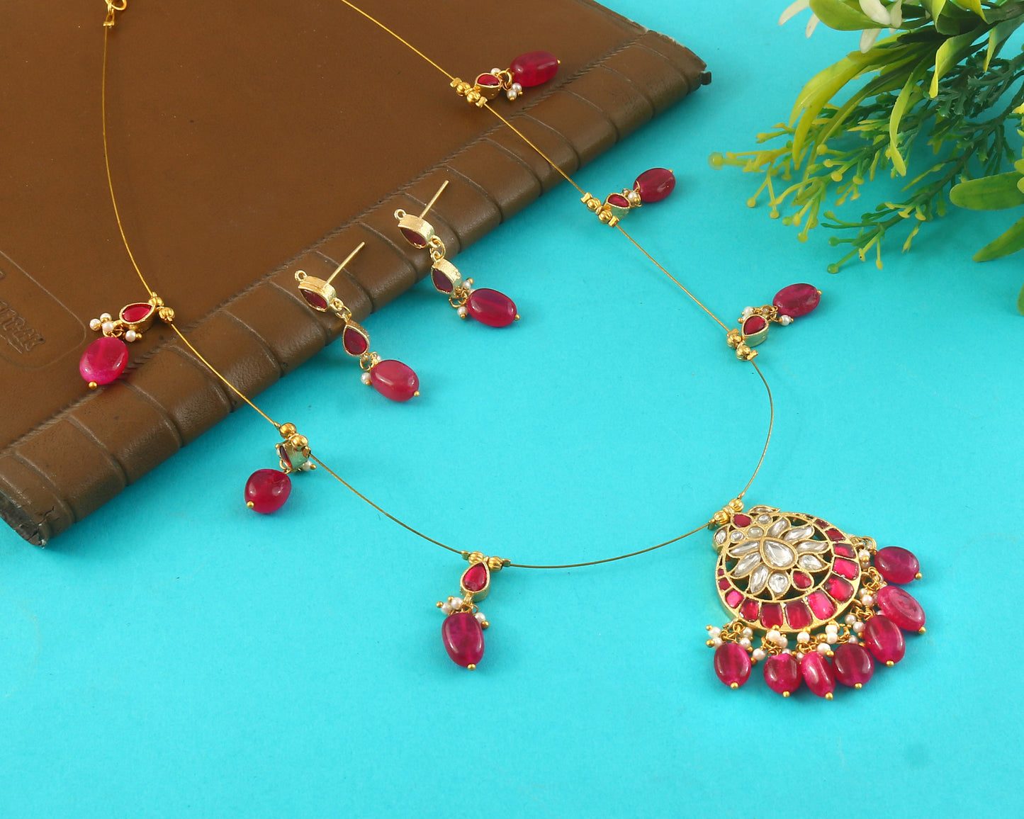 Jadau Kundan Necklace Set is beautifully handcrafted with premium Kundan stones in a classic Jadau setting. Inspired by the royal