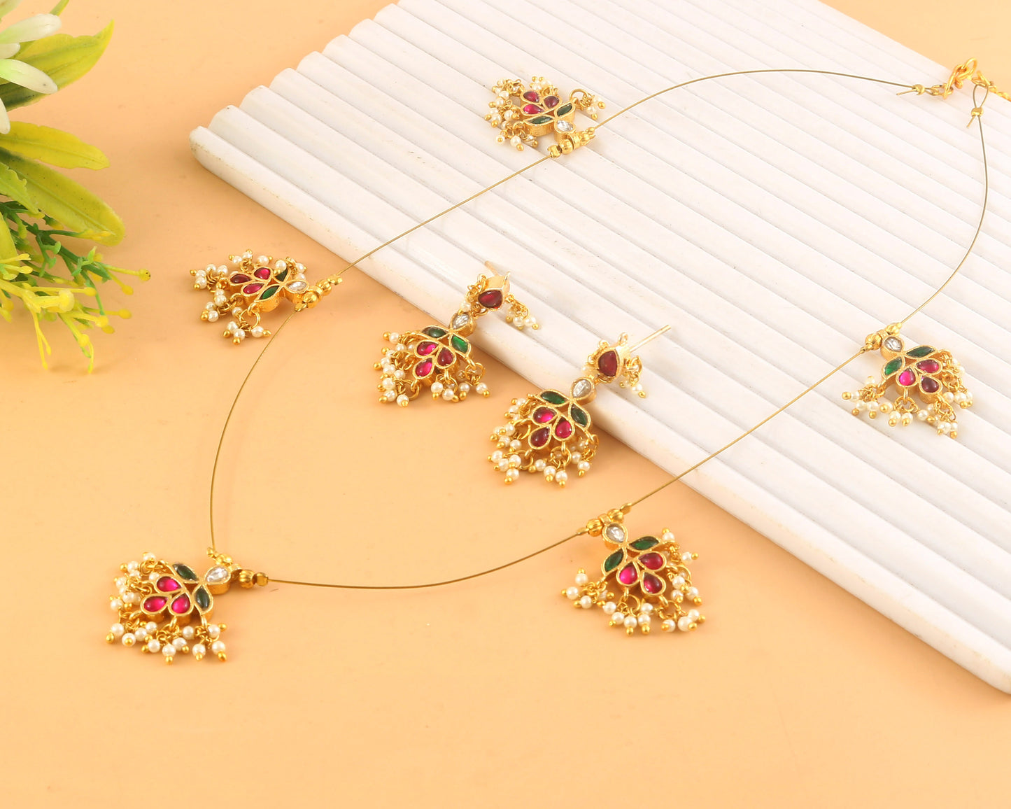 Jadau Kundan Necklace Set is beautifully handcrafted with premium