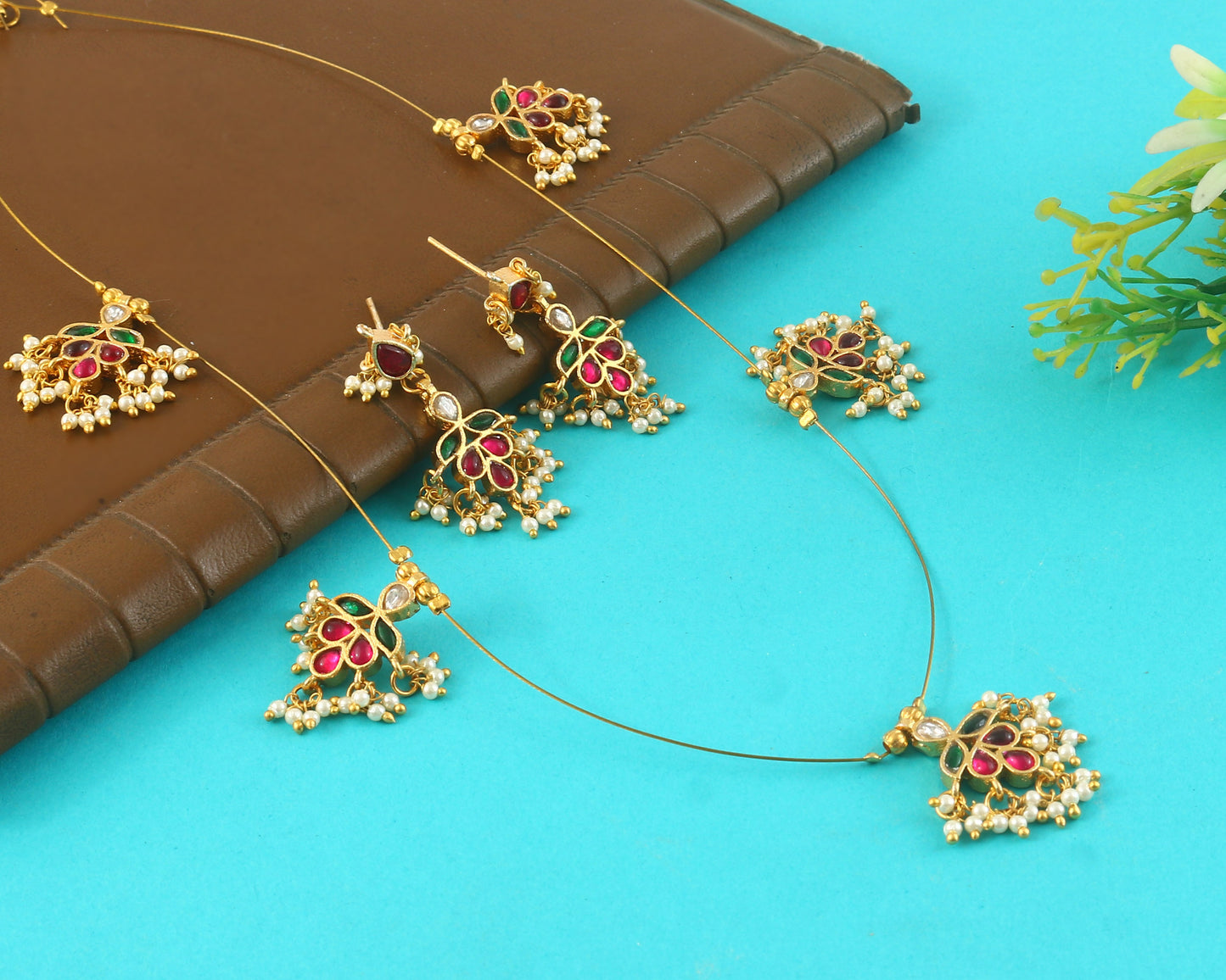 Jadau Kundan Necklace Set is beautifully handcrafted with premium