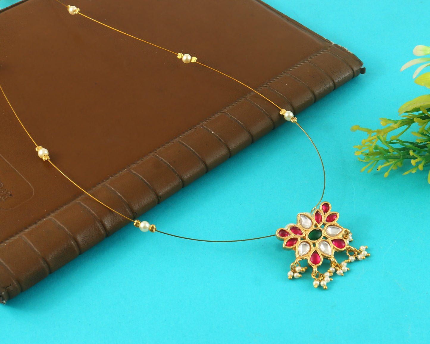 Jadau Kundan Necklace Set is beautifully handcrafted with premium
