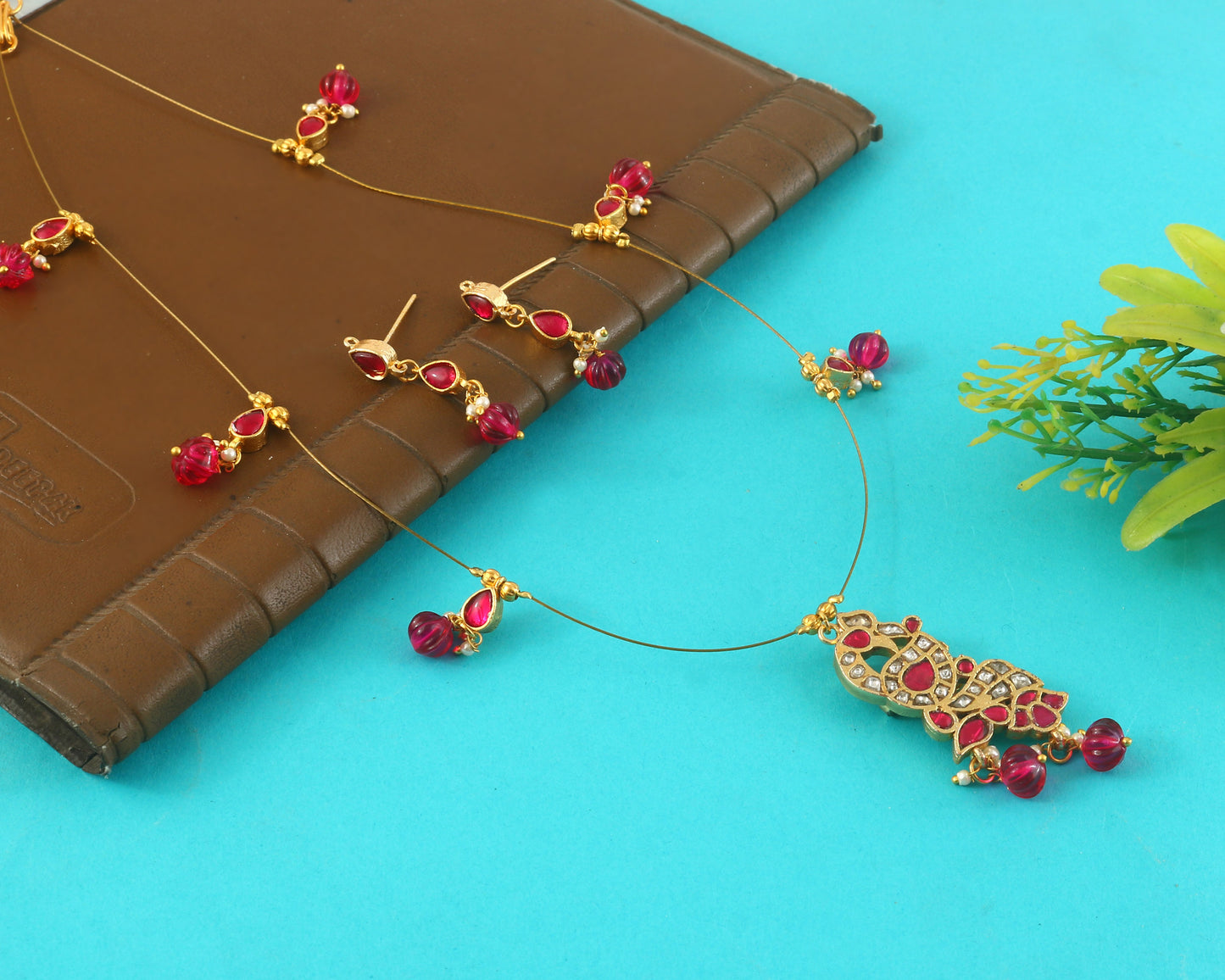 Jadau Kundan Necklace Set is beautifully handcrafted with premium Kundan