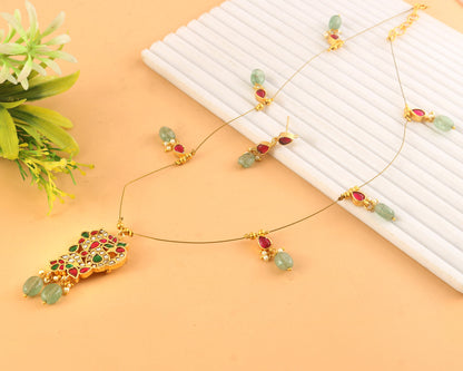 Jadau Kundan Necklace Set is beautifully handcrafted with premium