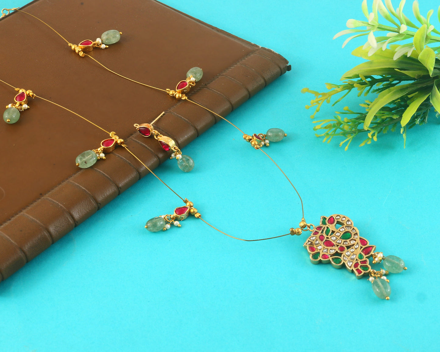 Jadau Kundan Necklace Set is beautifully handcrafted with premium
