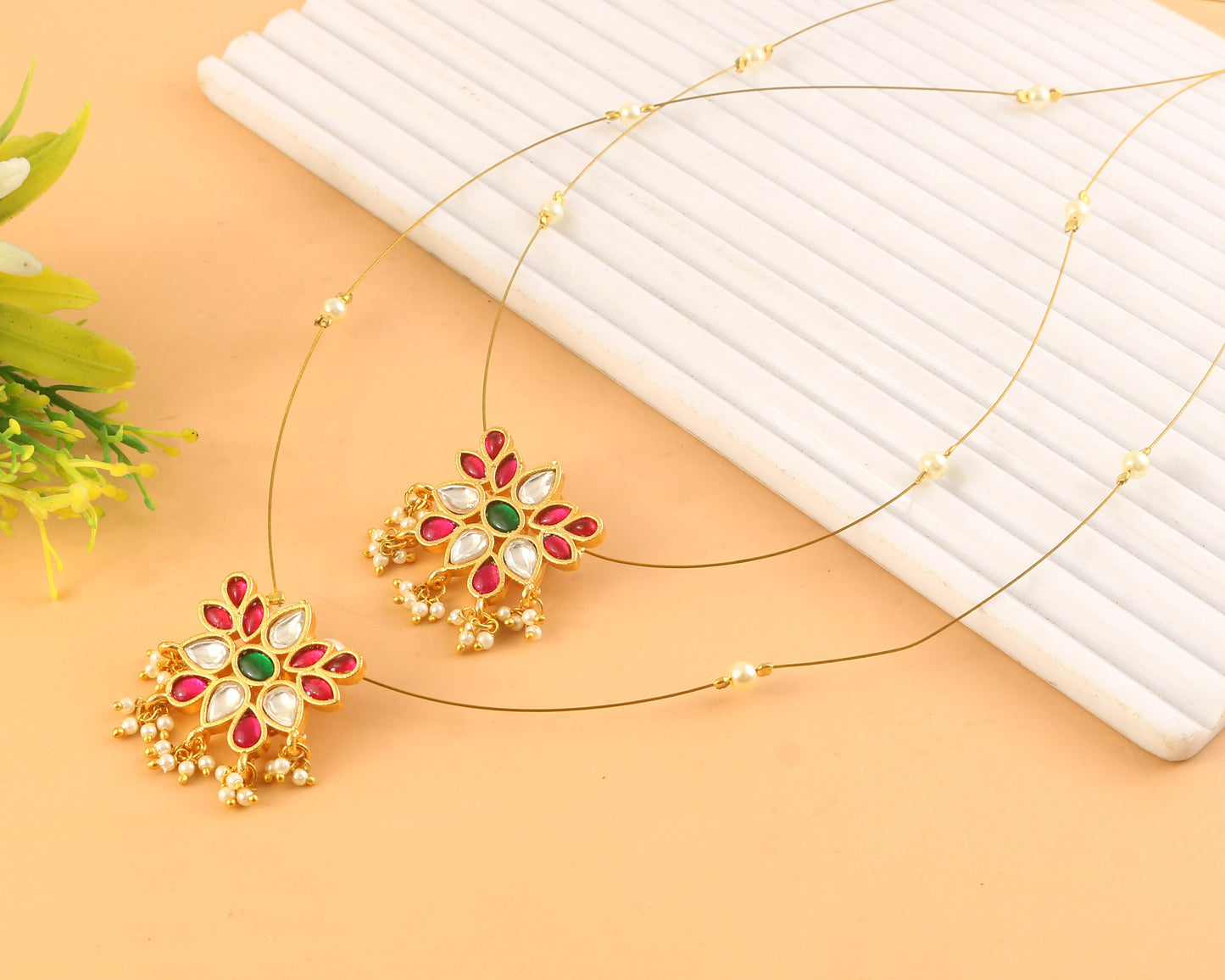 Jadau Kundan Necklace Set is beautifully handcrafted with premium Kundan
