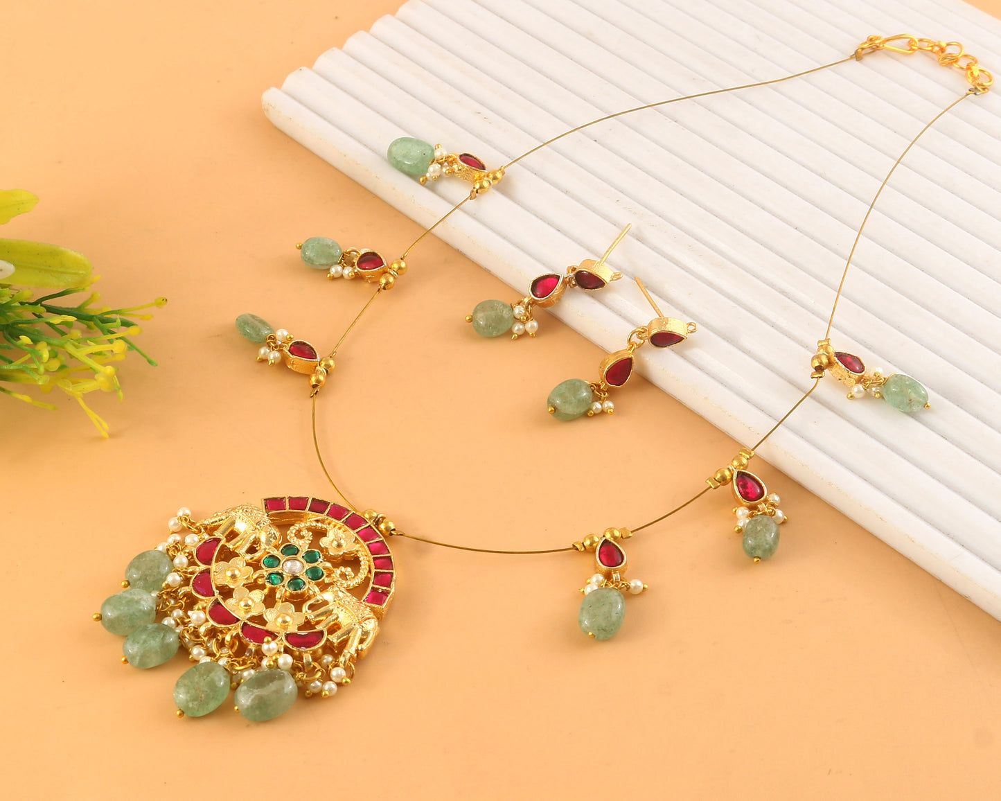 Jadau Kundan Necklace Set is beautifully handcrafted with premium Kundan