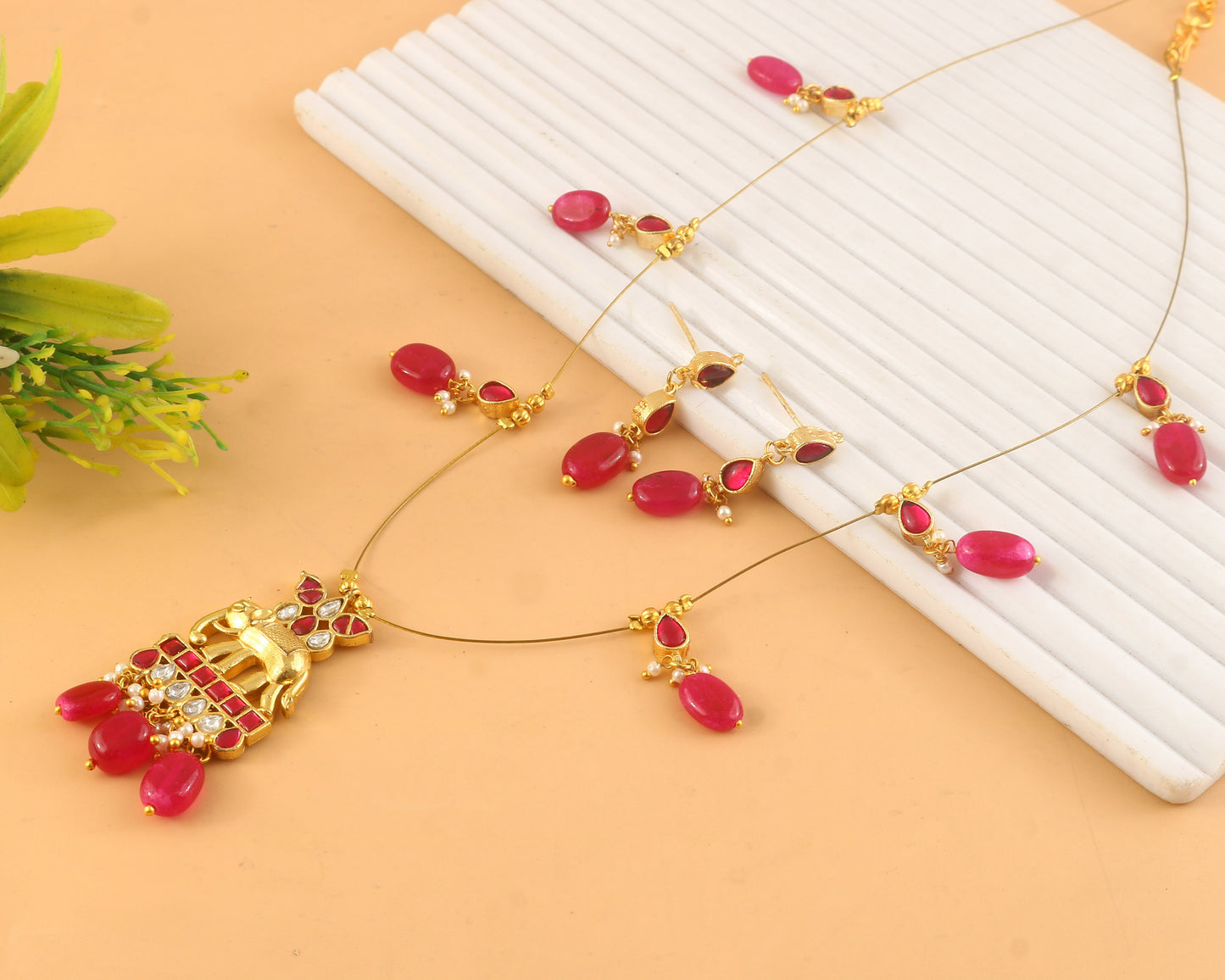Jadau Kundan Necklace Set is beautifully handcrafted with premium Kundan