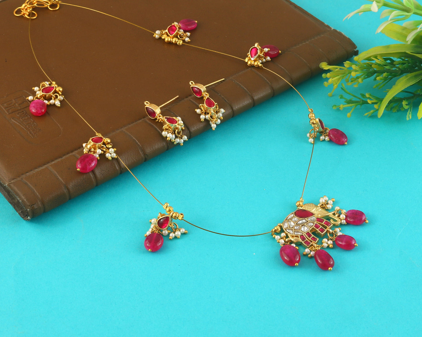 Jadau Kundan Necklace Set is beautifully handcrafted with premium Kundan