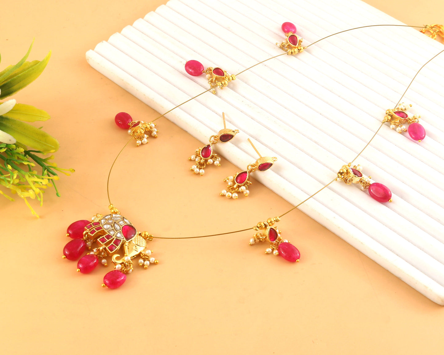 Jadau Kundan Necklace Set is beautifully handcrafted with premium Kundan