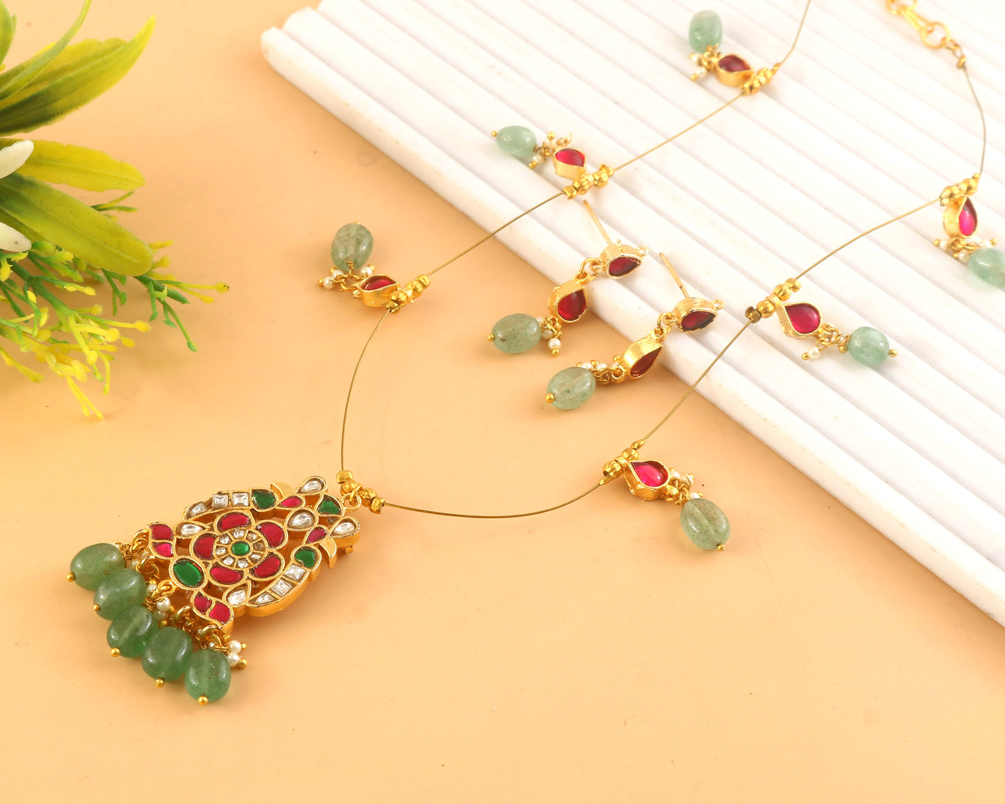 Jadau Kundan Necklace Set is beautifully handcrafted with premium Kundan