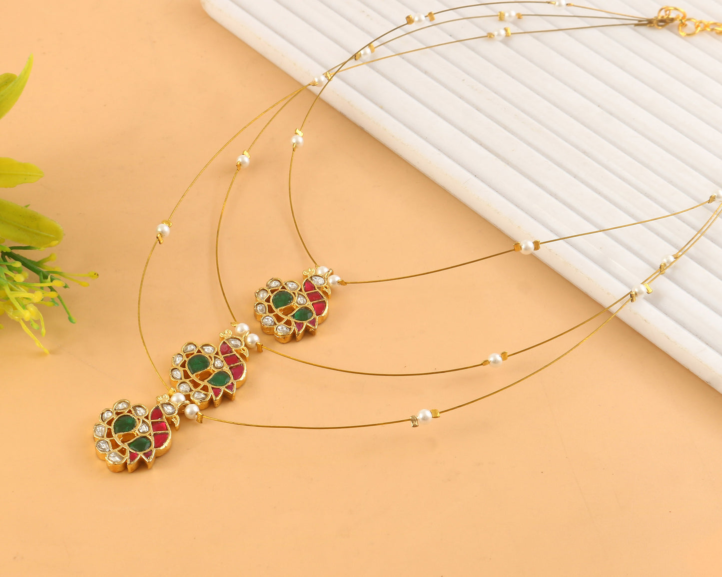 Jadau Kundan Necklace Set is beautifully handcrafted with premium Kundan