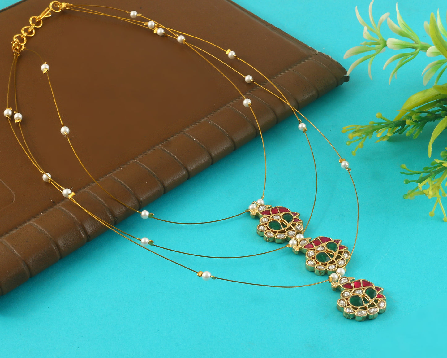 Jadau Kundan Necklace Set is beautifully handcrafted with premium Kundan