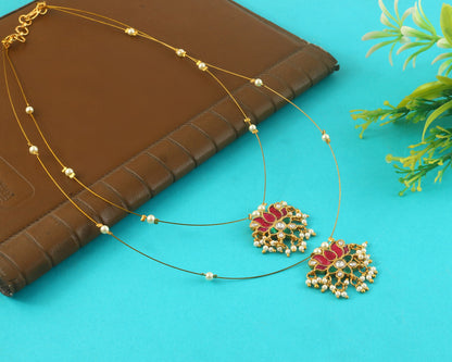 Jadau Kundan Necklace Set is beautifully handcrafted with premium Kundan