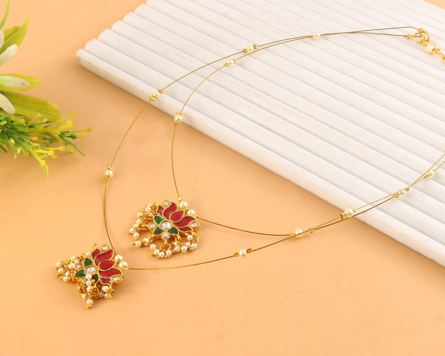 Jadau Kundan Necklace Set is beautifully handcrafted with premium Kundan