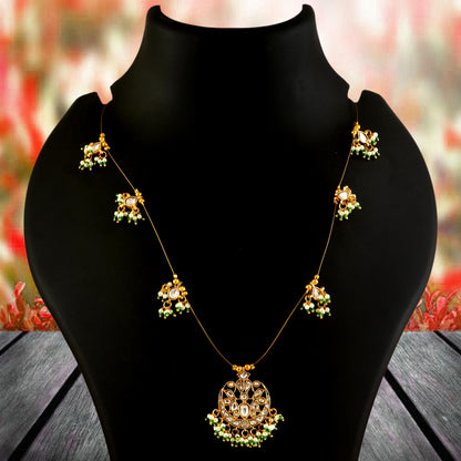 Jadau Kundan Necklace Set is beautifully handcrafted with premium Kundan