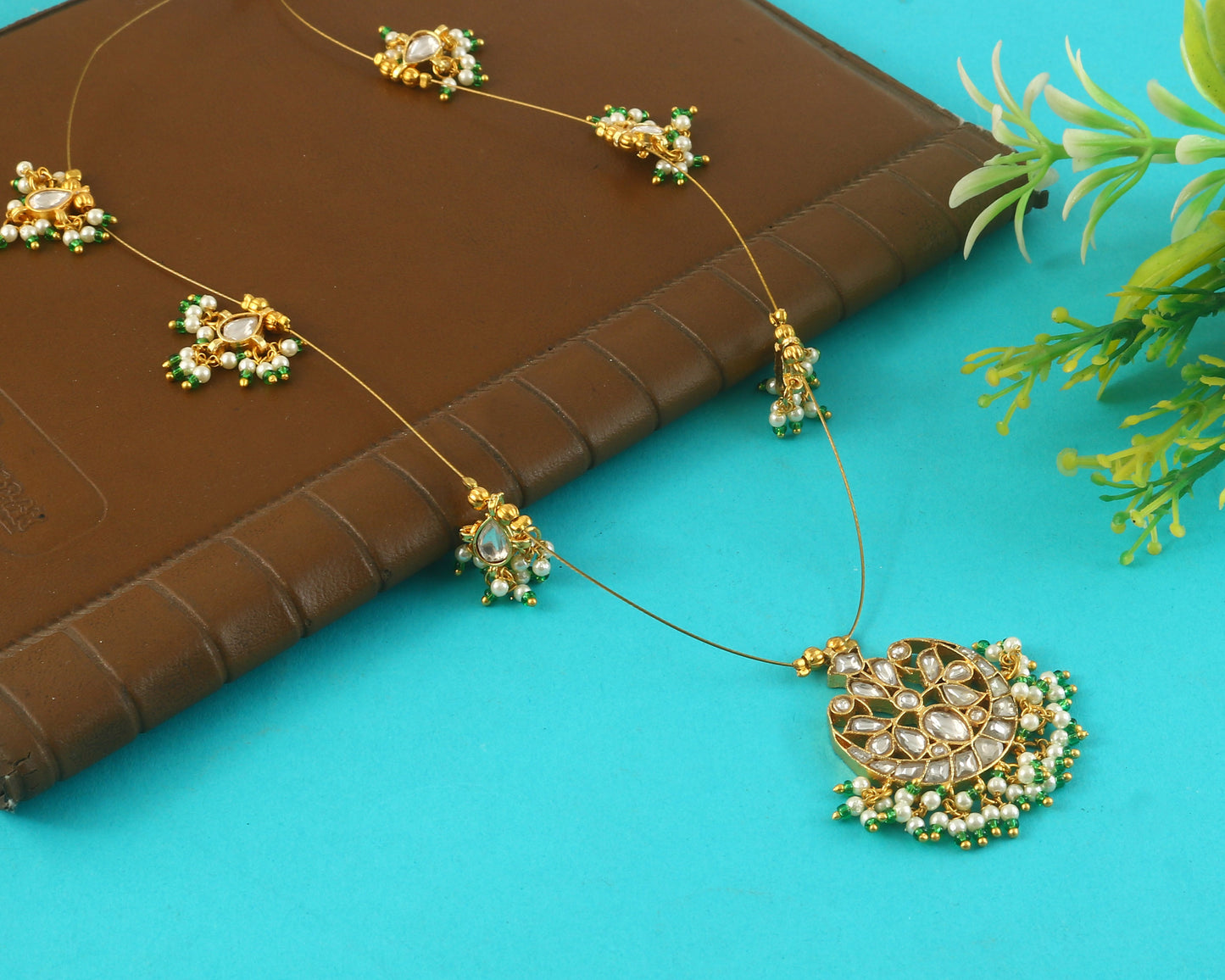 Jadau Kundan Necklace Set is beautifully handcrafted with premium Kundan