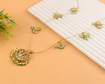 Jadau Kundan Necklace Set is beautifully handcrafted with premium Kundan