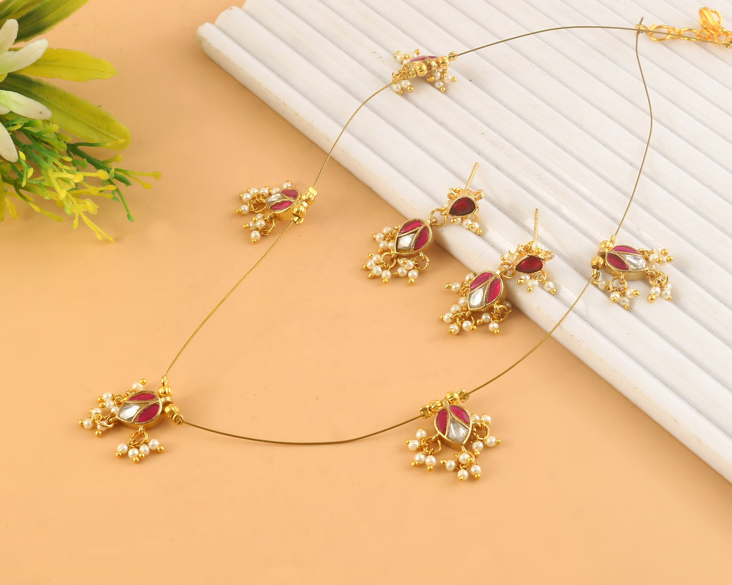 Jadau Kundan Necklace Set is beautifully handcrafted with premium Kundan