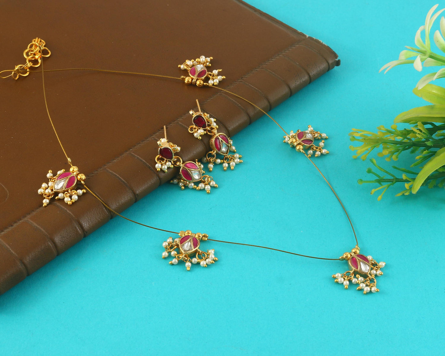 Jadau Kundan Necklace Set is beautifully handcrafted with premium Kundan