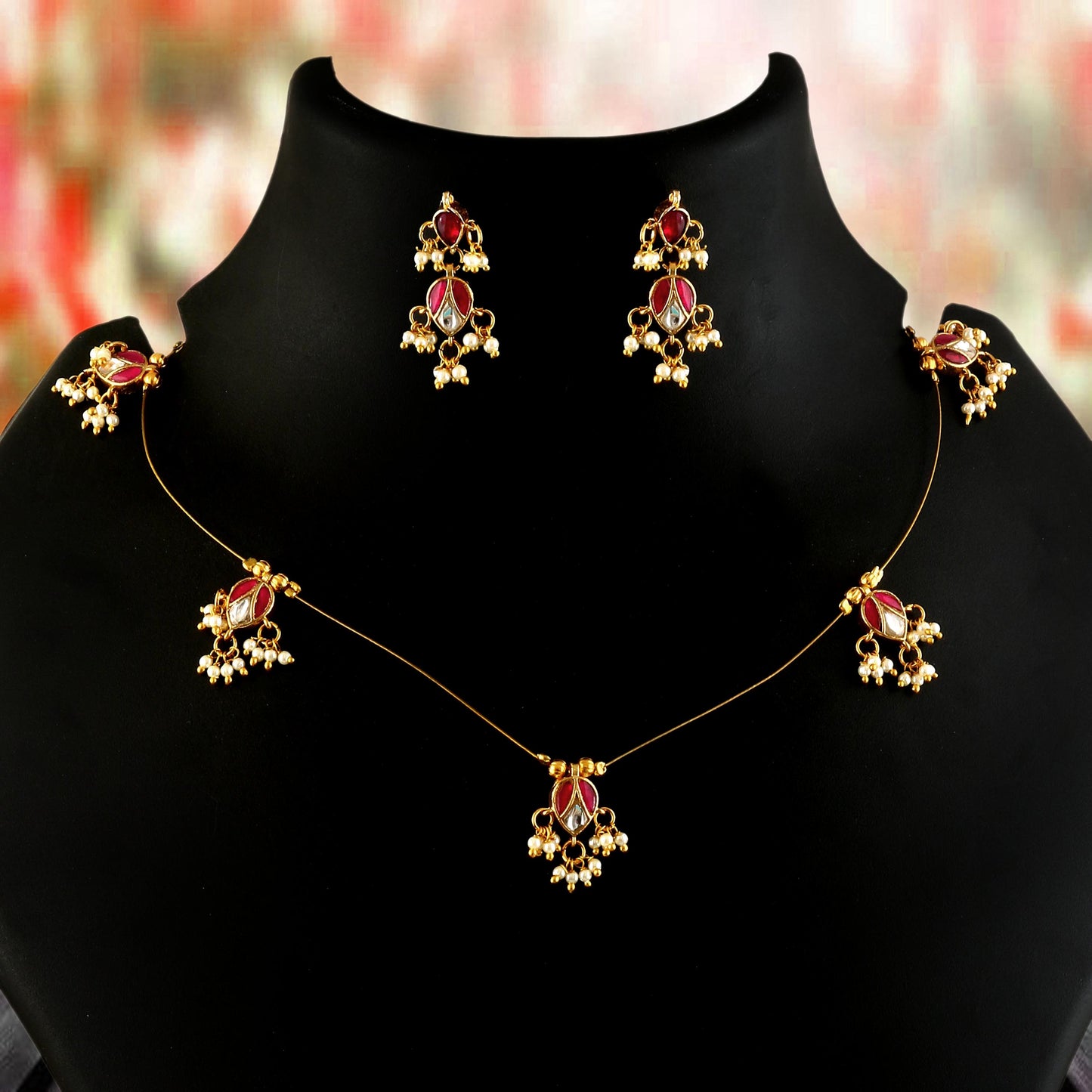 Jadau Kundan Necklace Set is beautifully handcrafted with premium Kundan