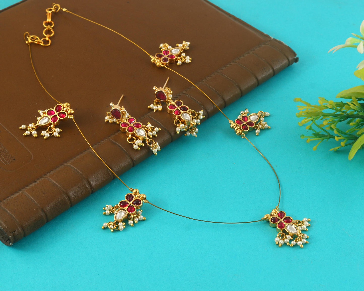 Jadau Kundan Necklace Set is beautifully handcrafted with premium Kundan