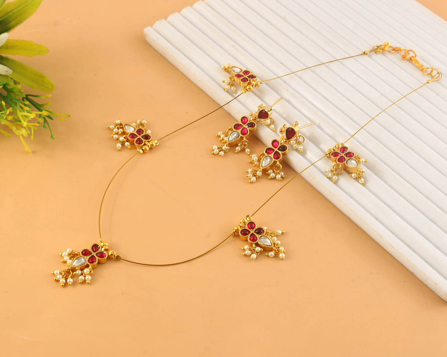 Jadau Kundan Necklace Set is beautifully handcrafted with premium Kundan