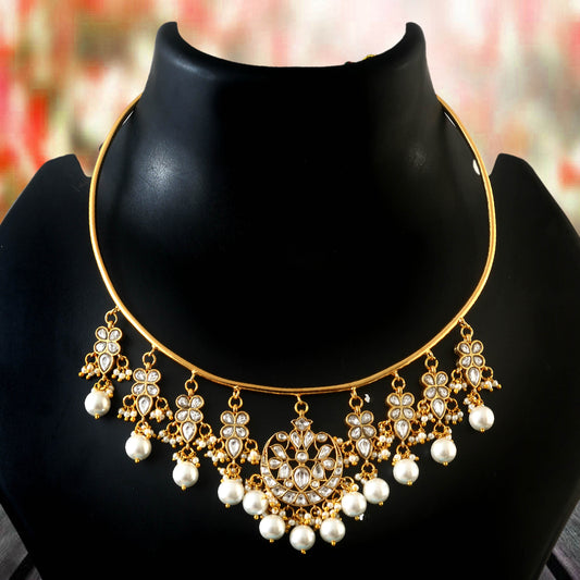 Gold polki and kundan embellished necklace set