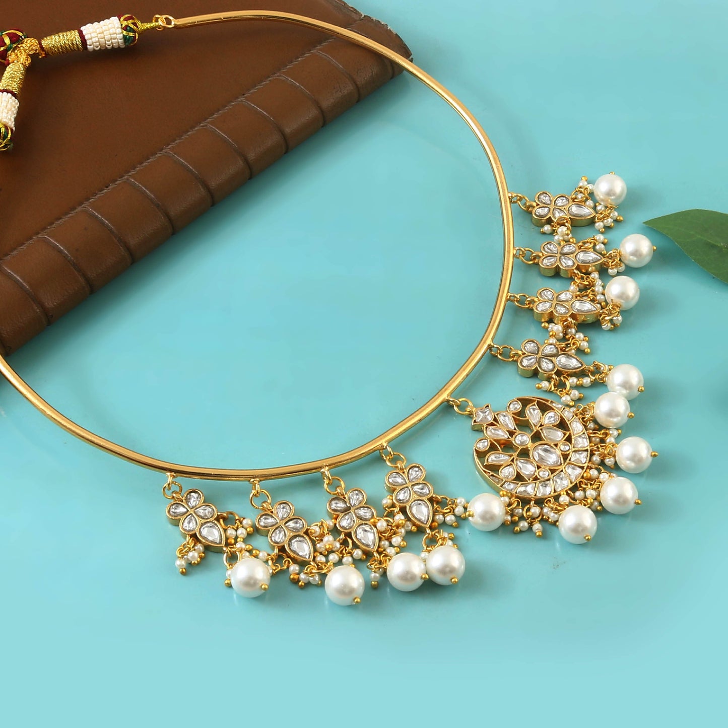 Gold polki and kundan embellished necklace set