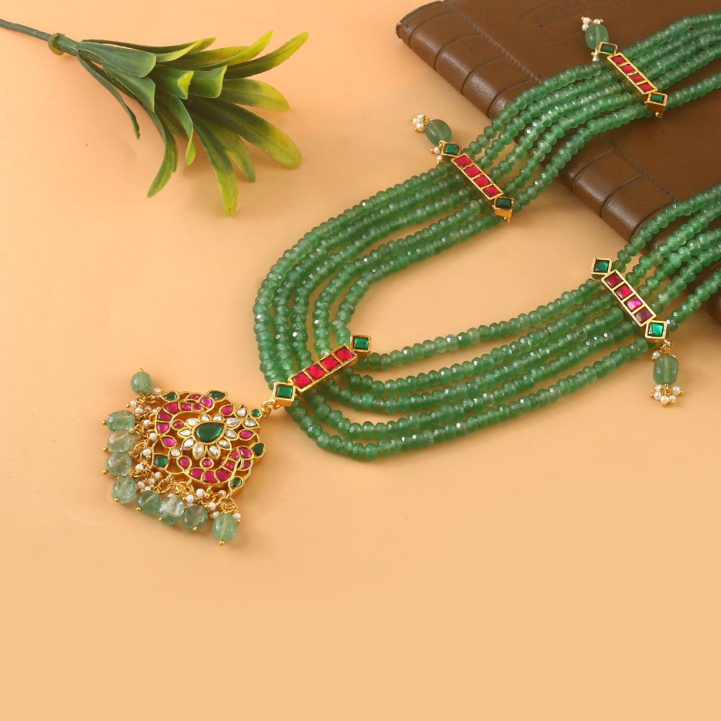 Beaded multilayer green haaram with kemp stones and beads & pearl hangings